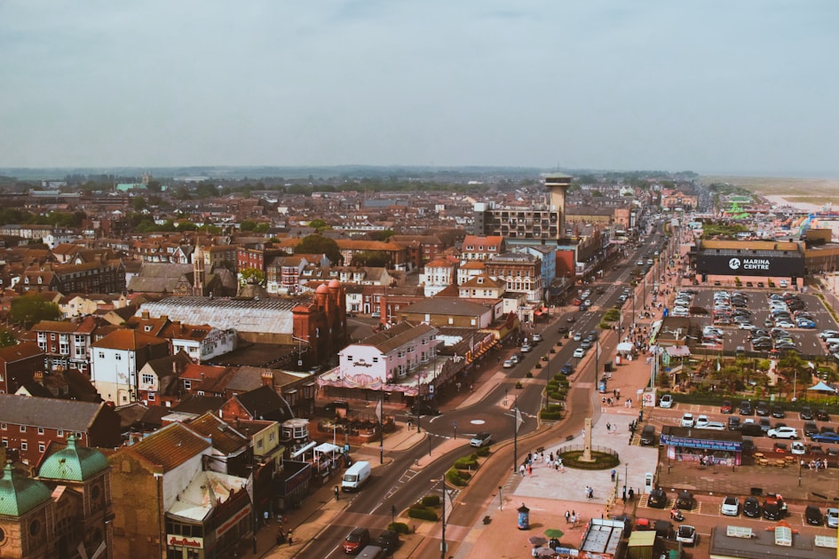 an aerial view of a city with lots of tall buildings