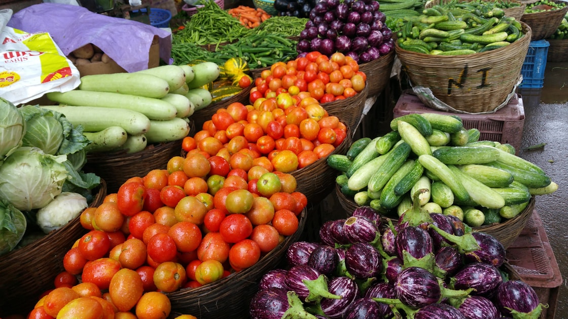 orange and green vegetables on brown woven baskets