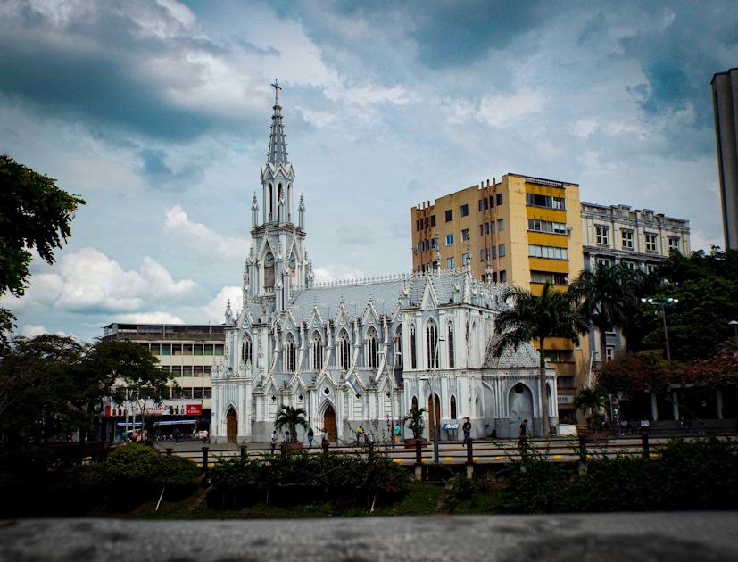 A large white building with a tall tower