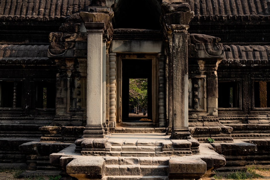 A very old building with a big door