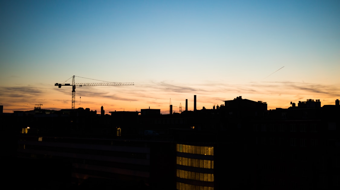 silhouette of building during sunset