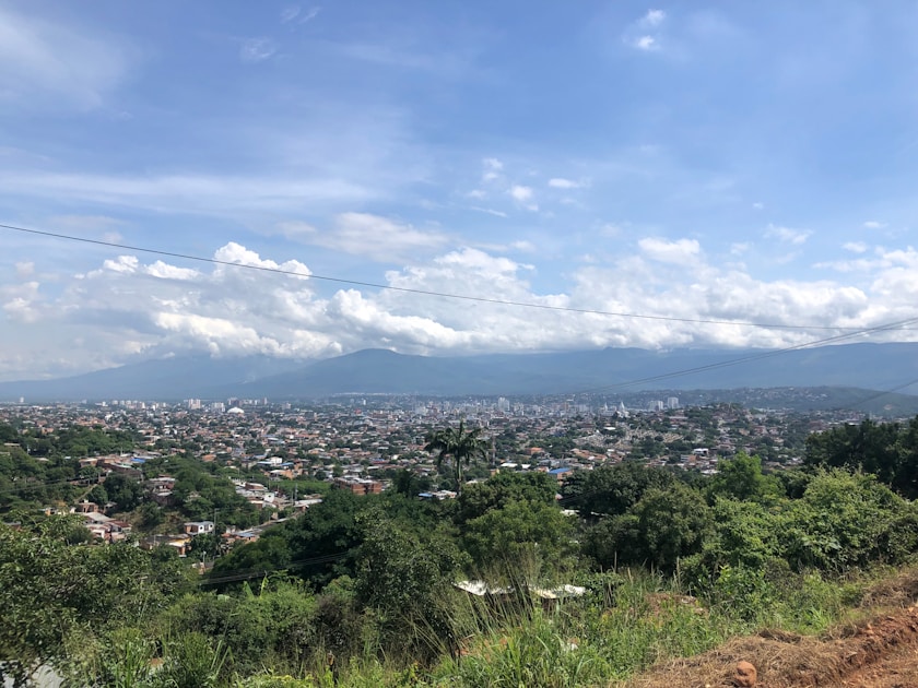 a view of a city from the top of a hill