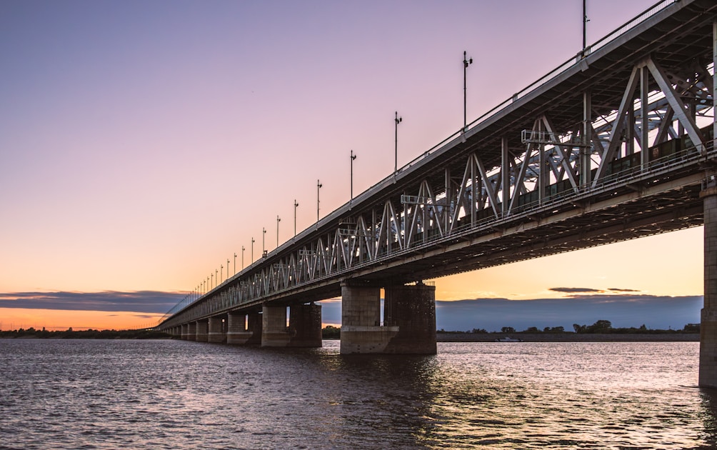 A large bridge spanning over a large body of water