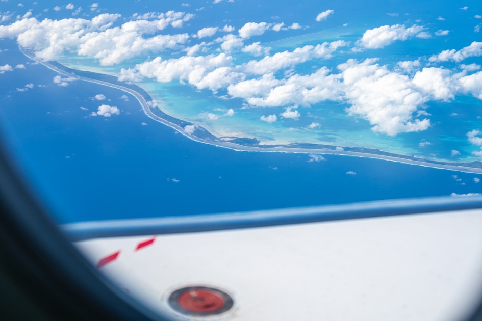 A view of the ocean from a plane window