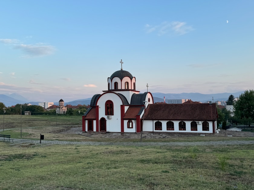 A small church in the middle of a field