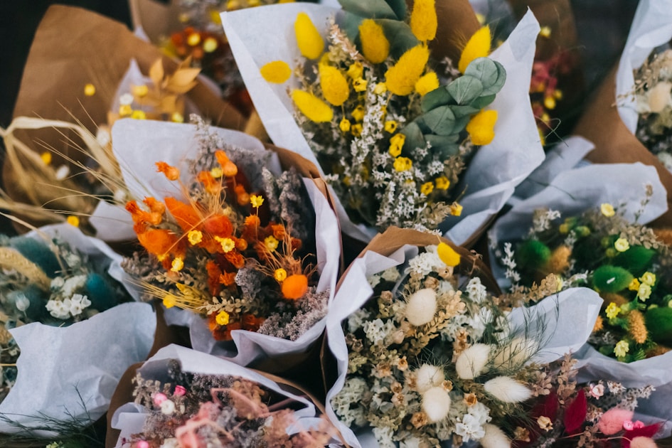 a bunch of flowers that are sitting on a table
