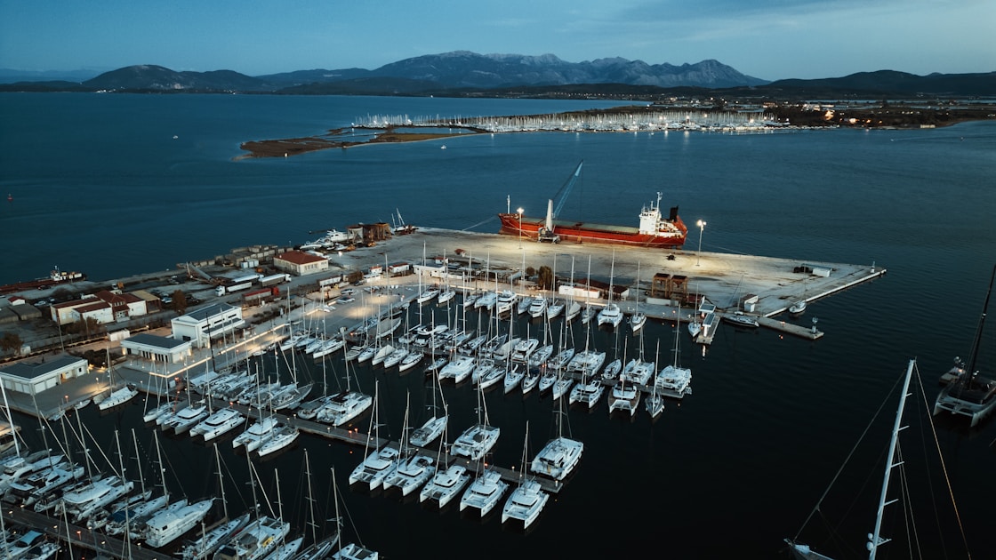 a boat dock with many boats docked in it