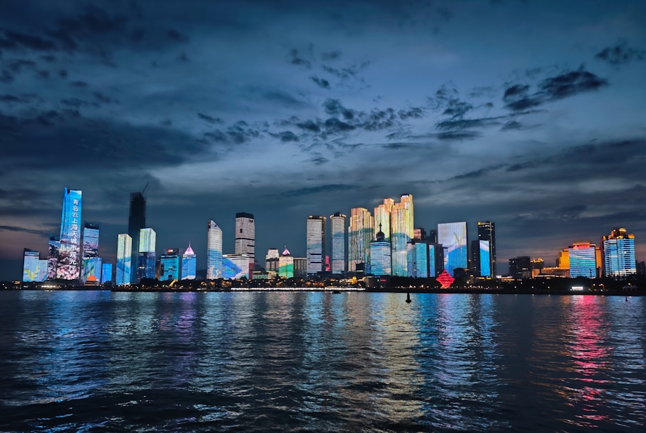 A large body of water with a city in the background