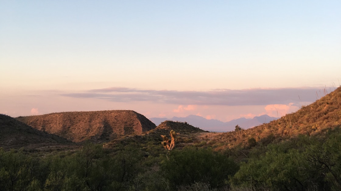 brown mountain under blue sky during daytime