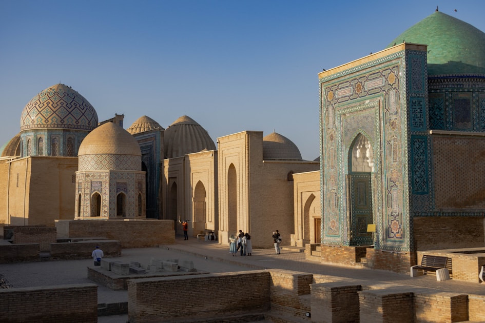 A large building with a green dome on top of it