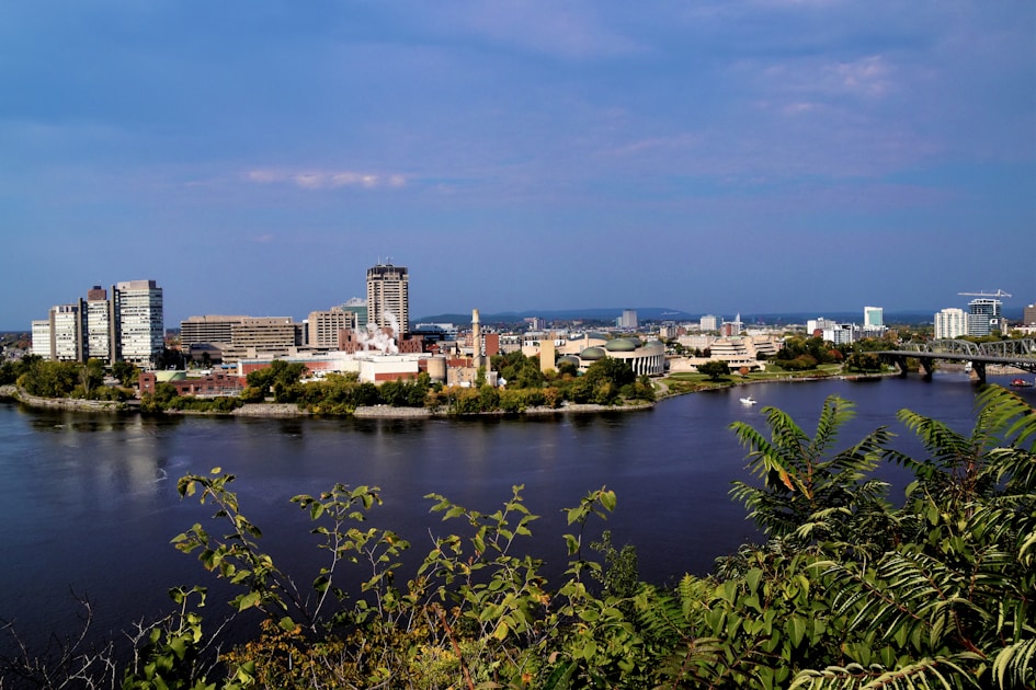 city skyline under blue sky during daytime