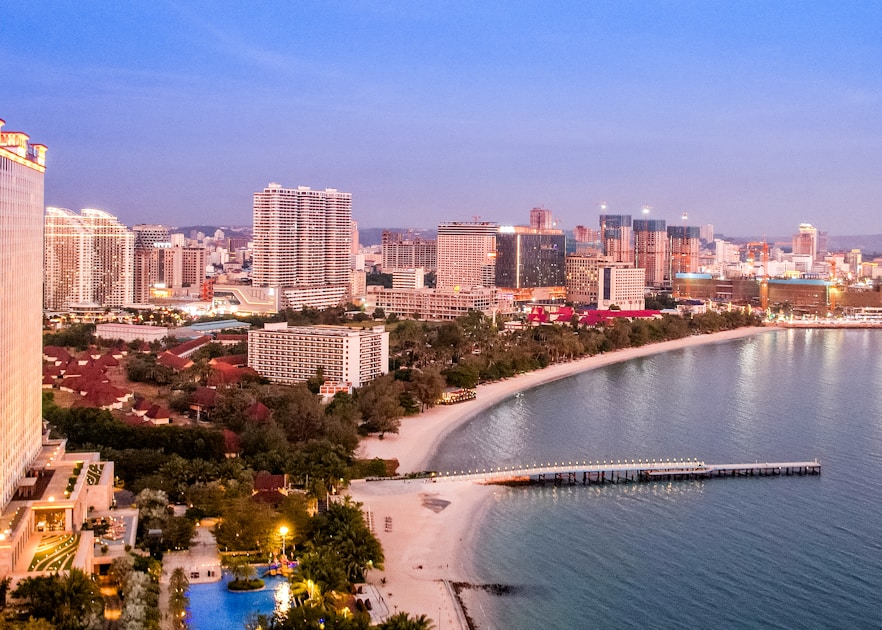 An aerial view of a city and a body of water