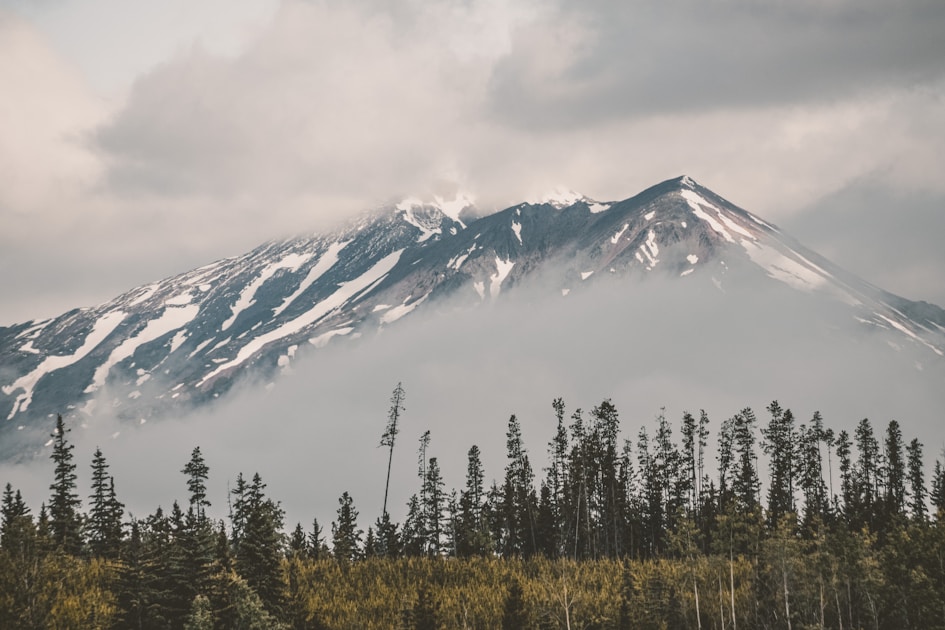 snow covered mountain during daytime