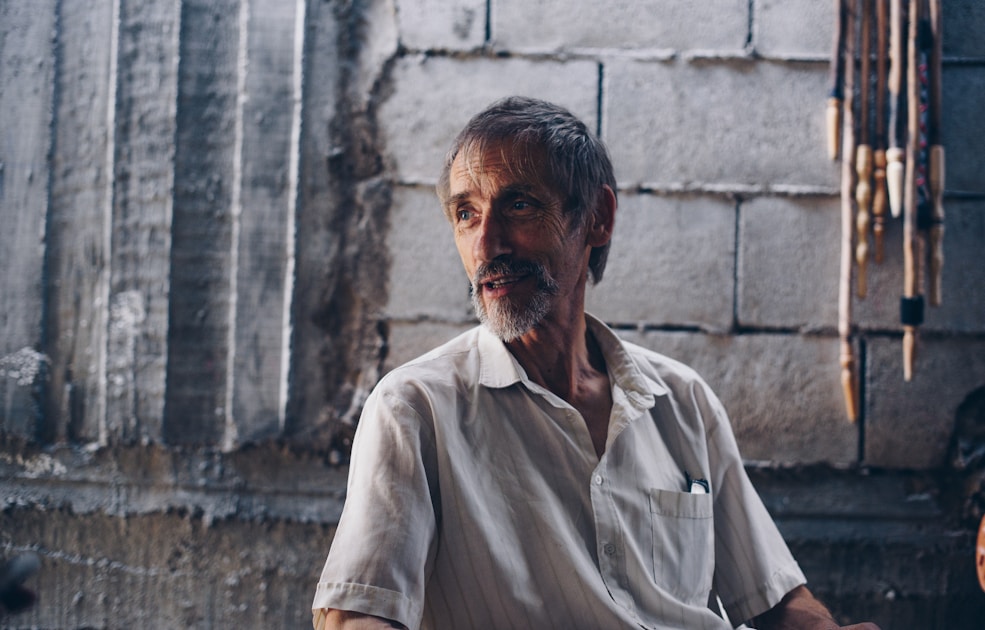 man wearing white button-up shirt