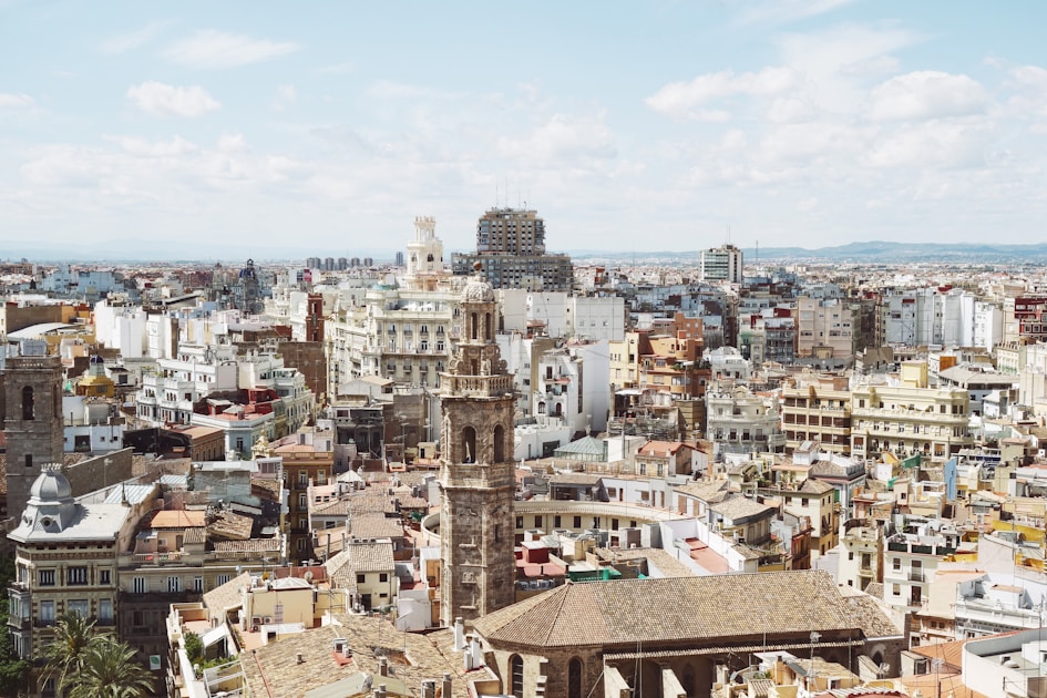 gray concrete tower beside house