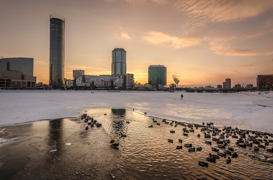 frozen lake beside city
